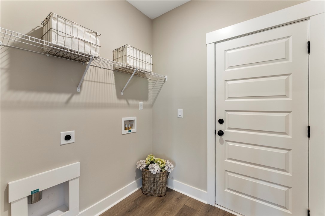 133 Osprey Landing Central, SC 29630 - Photo 10 of 34 Functional laundry space with convenient shelving.