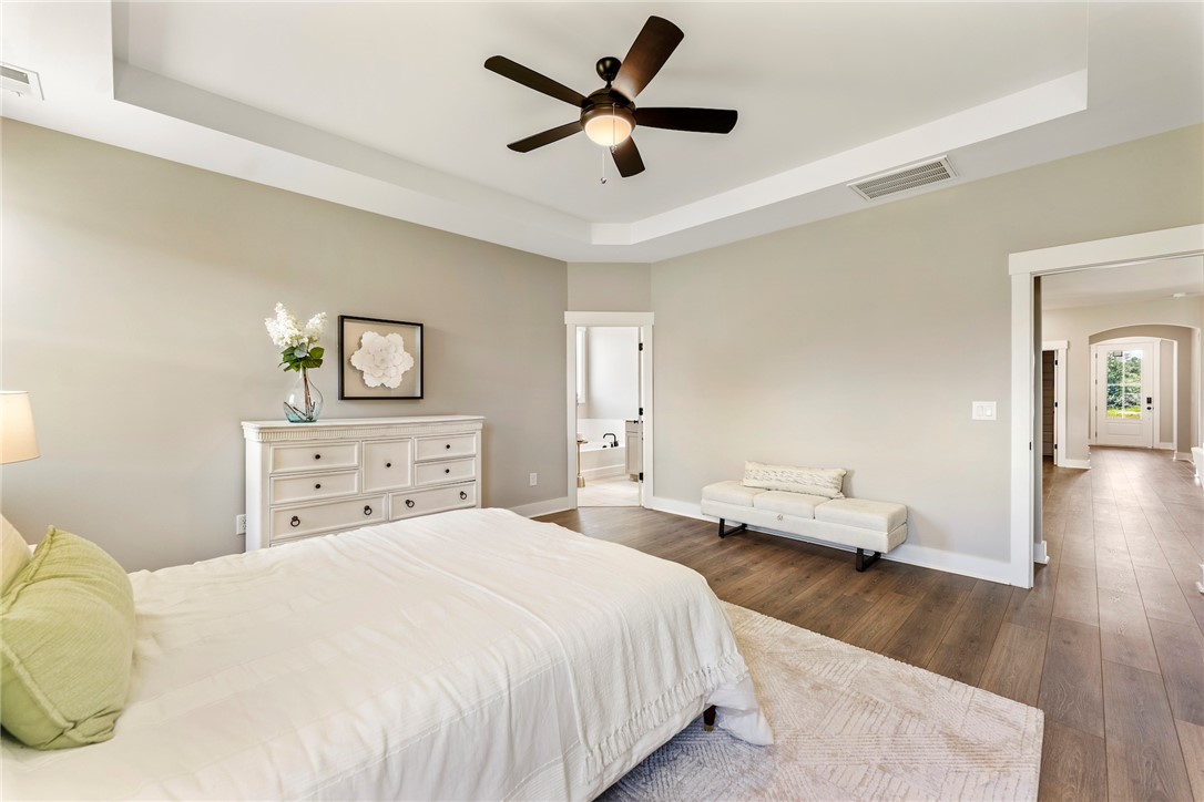 133 Osprey Landing Central, SC 29630 - Photo 13 of 34 This spacious bedroom offers ample comfort and direct access to a private bath.