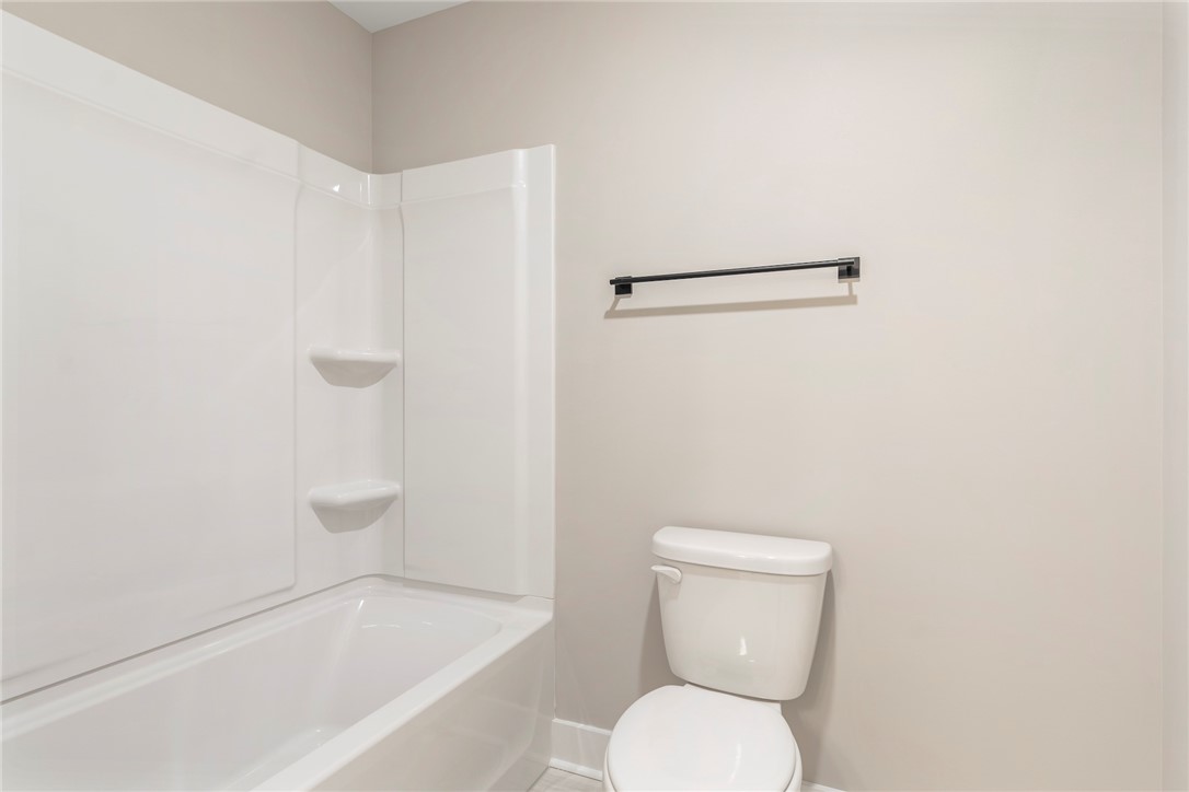 133 Osprey Landing Central, SC 29630 - Photo 20 of 34 This serene bathroom offers a clean, functional design with a full bath and essential amenities.