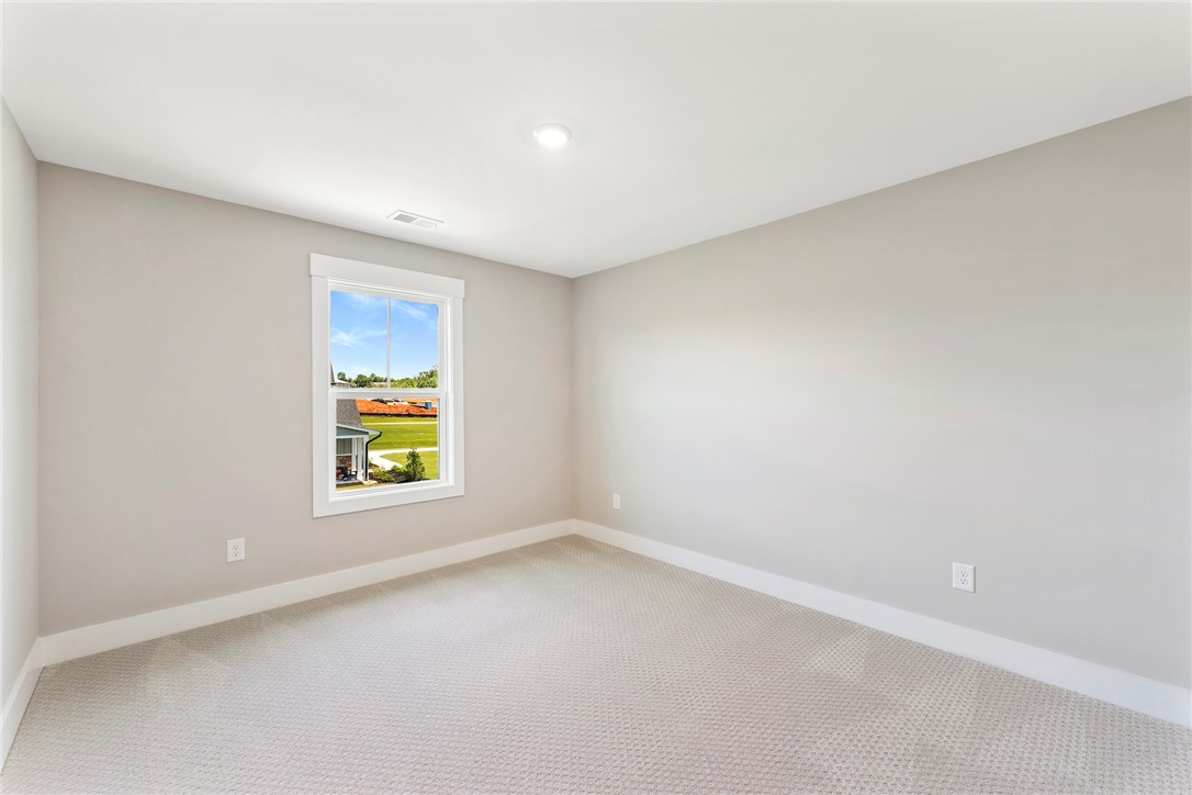 133 Osprey Landing Central, SC 29630 - Photo 23 of 34 This spacious room provides a bright and airy atmosphere perfect for relaxation.