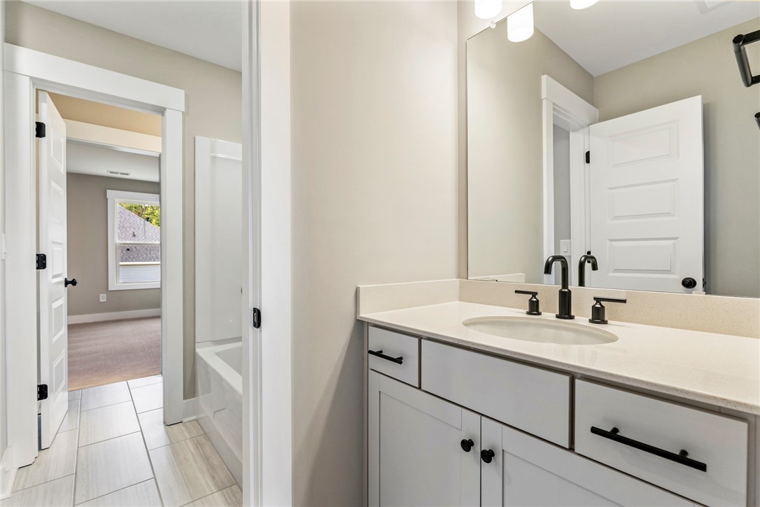 133 Osprey Landing Central, SC 29630 - Photo 26 of 34 This bathroom features a contemporary vanity and elegant fixtures, creating a clean and refreshing space.