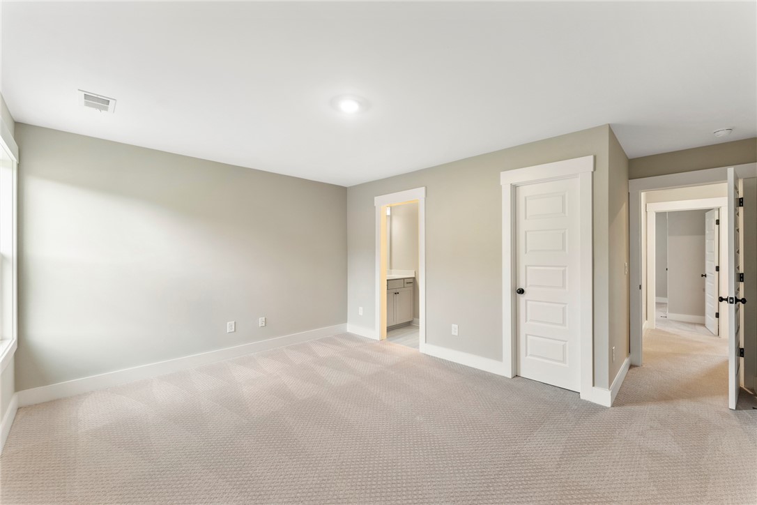 133 Osprey Landing Central, SC 29630 - Photo 28 of 34 This spacious room provides a blank canvas for personalization, offering endless possibilities for comfort and style.