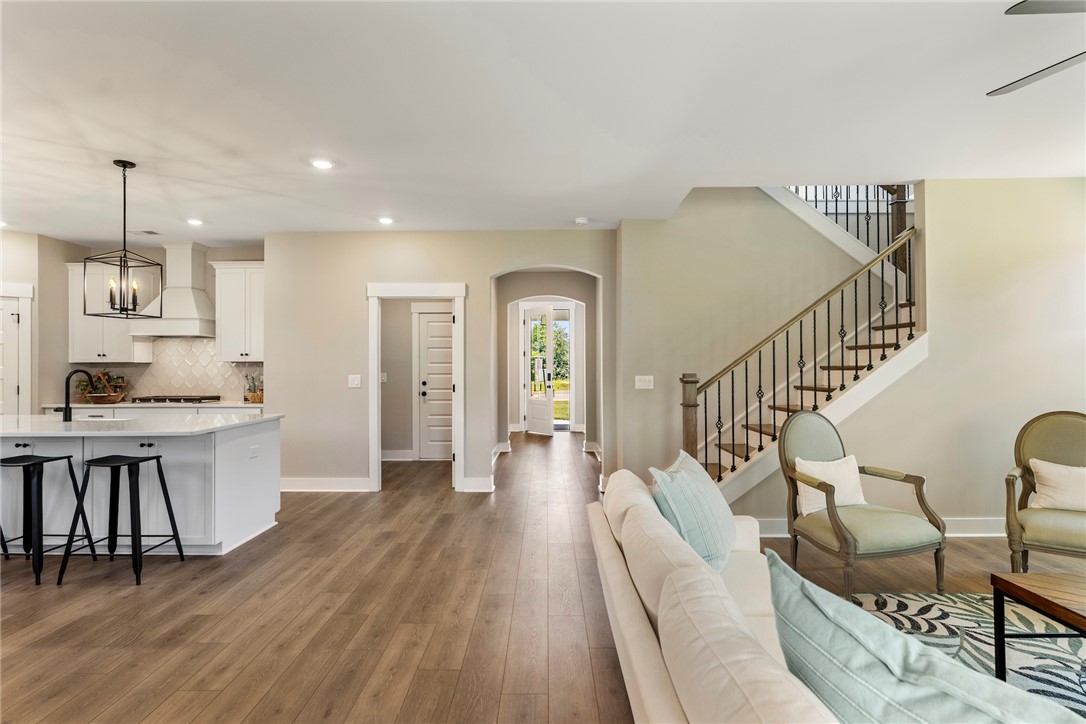 133 Osprey Landing Central, SC 29630 - Photo 33 of 34 This bright, airy interior features an open floor plan and beautiful hardwood floors, offering seamless living.