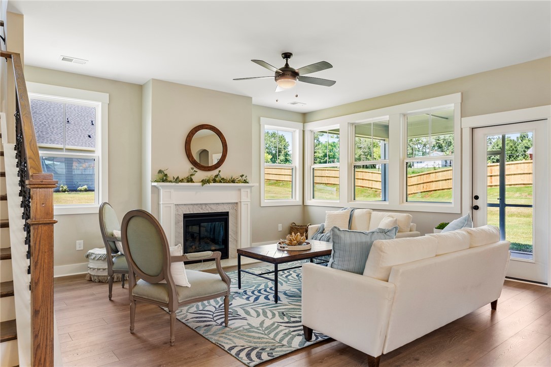 133 Osprey Landing Central, SC 29630 - Photo 6 of 34 This bright living room offers an inviting space for relaxation and gatherings.