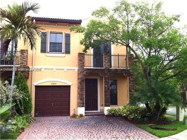 11459 Southwest 238th Street, Unit 11459 Homestead, FL 33032 - Photo 1 of 12 front view of a house