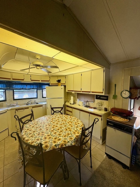 4-20 Woodhaven Sublette, IL 61367 - Photo 11 of 26 a kitchen with a table and chairs in it