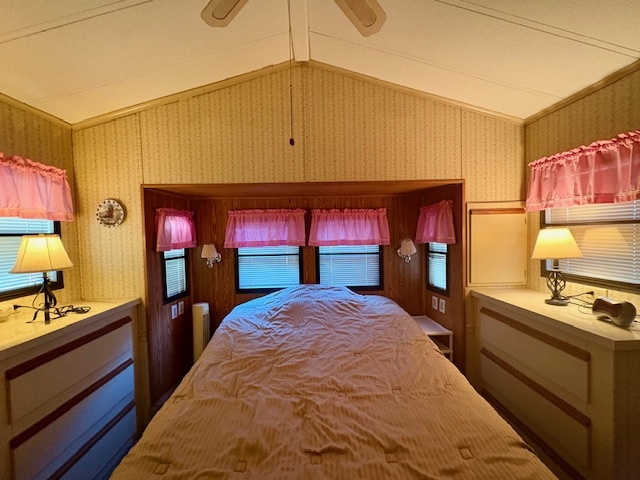 4-20 Woodhaven Sublette, IL 61367 - Photo 21 of 26 a bed room with a bed and a lamp