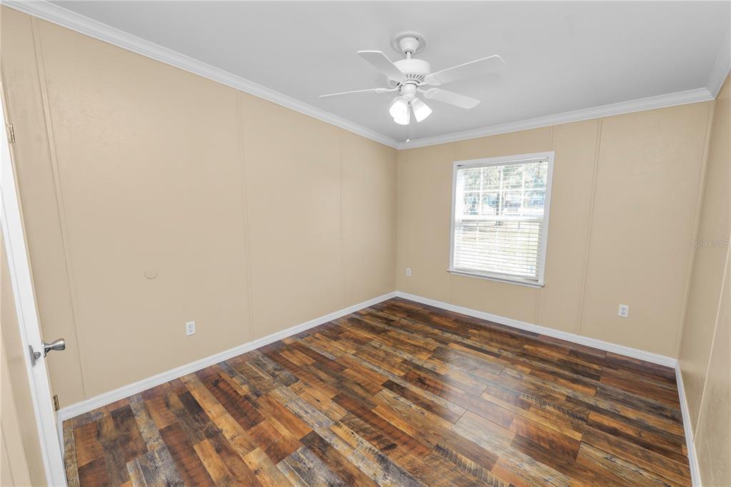 7405 Shoupe Road Plant City, FL 33565 - Photo 35 of 61 a view of an empty room with a window