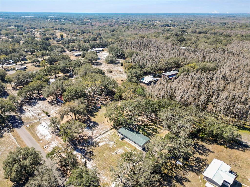 7405 Shoupe Road Plant City, FL 33565 - Photo 50 of 61 an aerial view of multiple house