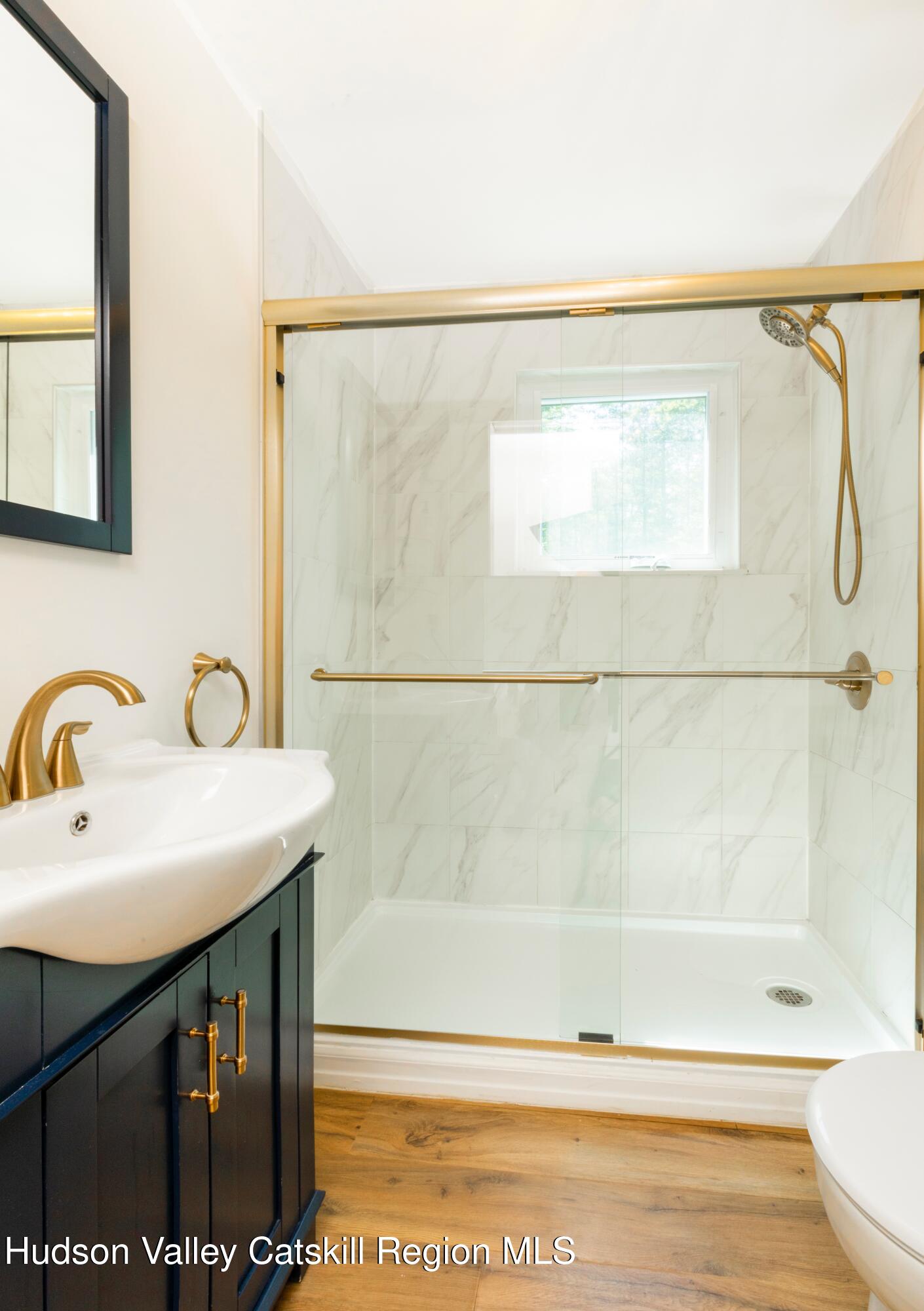 5813 Highway 44 Kerhonkson, NY 12446 - Photo 11 of 21 a bathroom with a sink and a bathtub