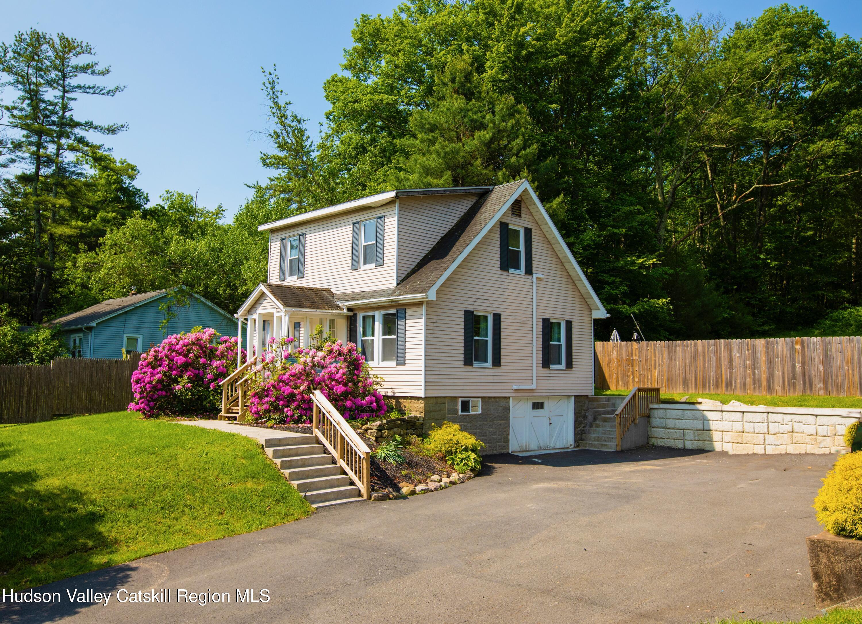 5813 Highway 44 Kerhonkson, NY 12446 - Photo 20 of 21 a view of a house with backyard and sitting area