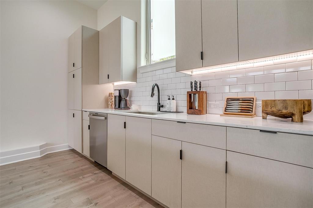 3231 Elihu Street, Unit 101 Dallas, TX 75210 - Photo 9 of 20 a kitchen with sink and cabinets