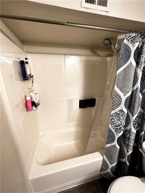 1205 Dutilh Road, Unit 1 Cranberry Township, PA 16066 - Photo 19 of 32 a bathroom with a toilet and a bathtub
