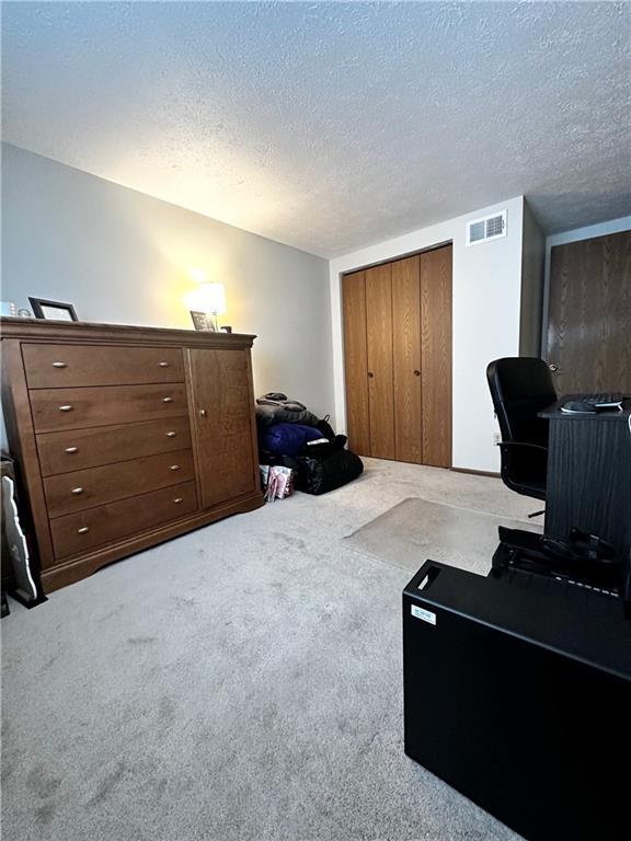 1205 Dutilh Road, Unit 1 Cranberry Township, PA 16066 - Photo 27 of 32 a bedroom with a bed and furniture