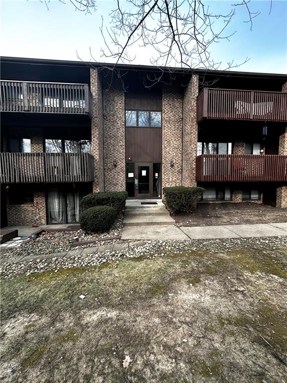 1205 Dutilh Road, Unit 1 Cranberry Township, PA 16066 - Photo 29 of 32 a front view of a house with a yard