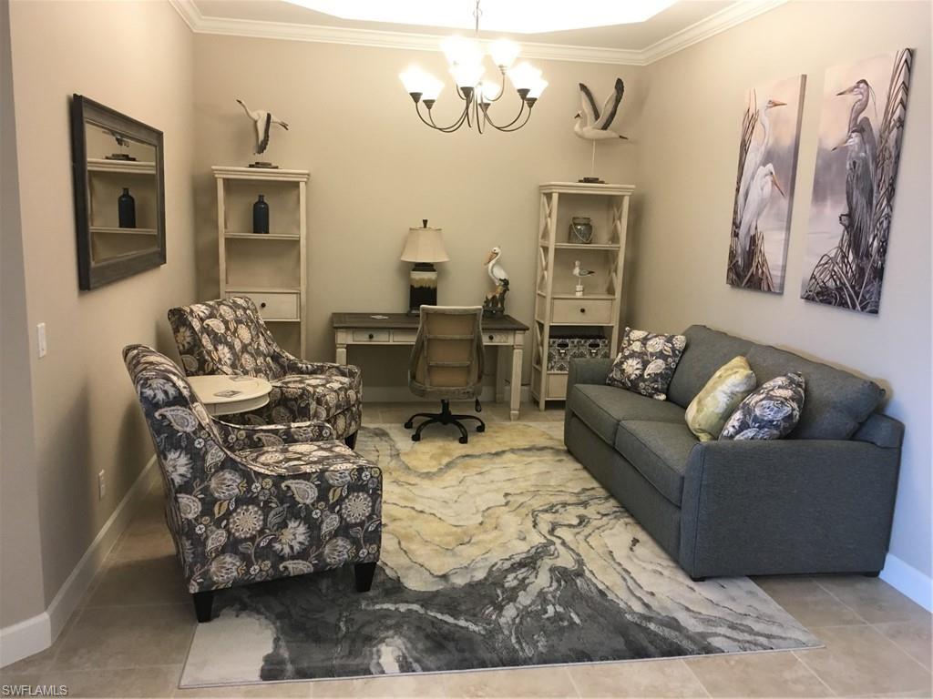 9685 Montelanico Loop, Unit 202 Naples, FL 34119 - Photo 7 of 21 a living room with furniture