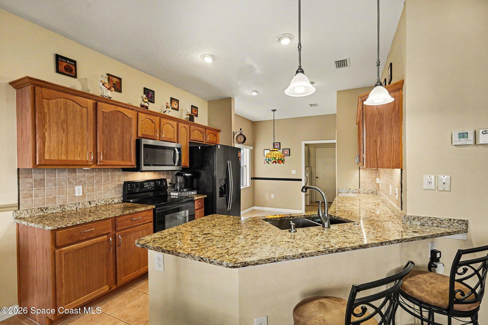 6973 Premonition Drive Melbourne, FL 32940 - Photo 11 of 91 010_file_7879