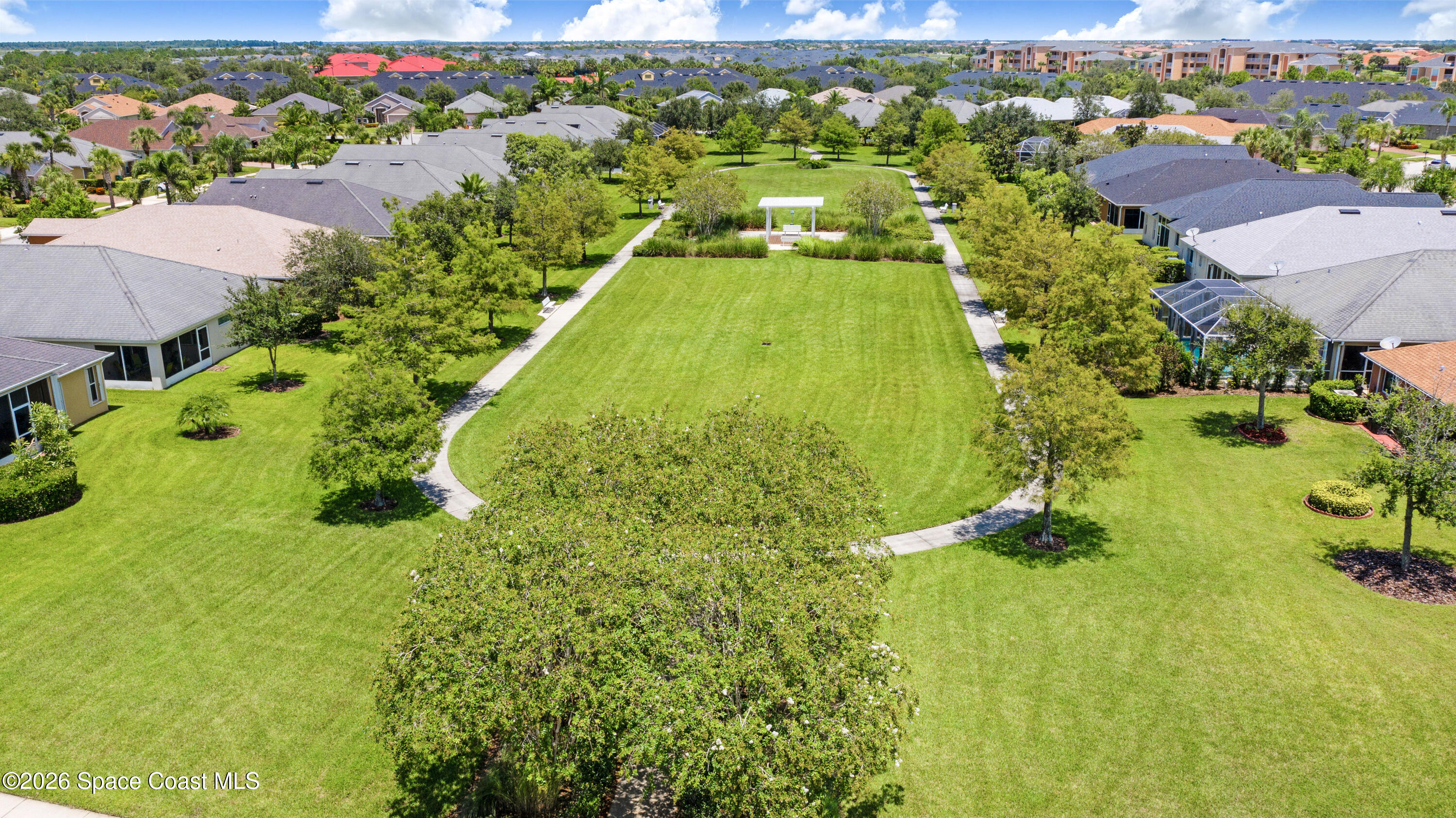 6973 Premonition Drive Melbourne, FL 32940 - Photo 57 of 91 a view of a yard with plants