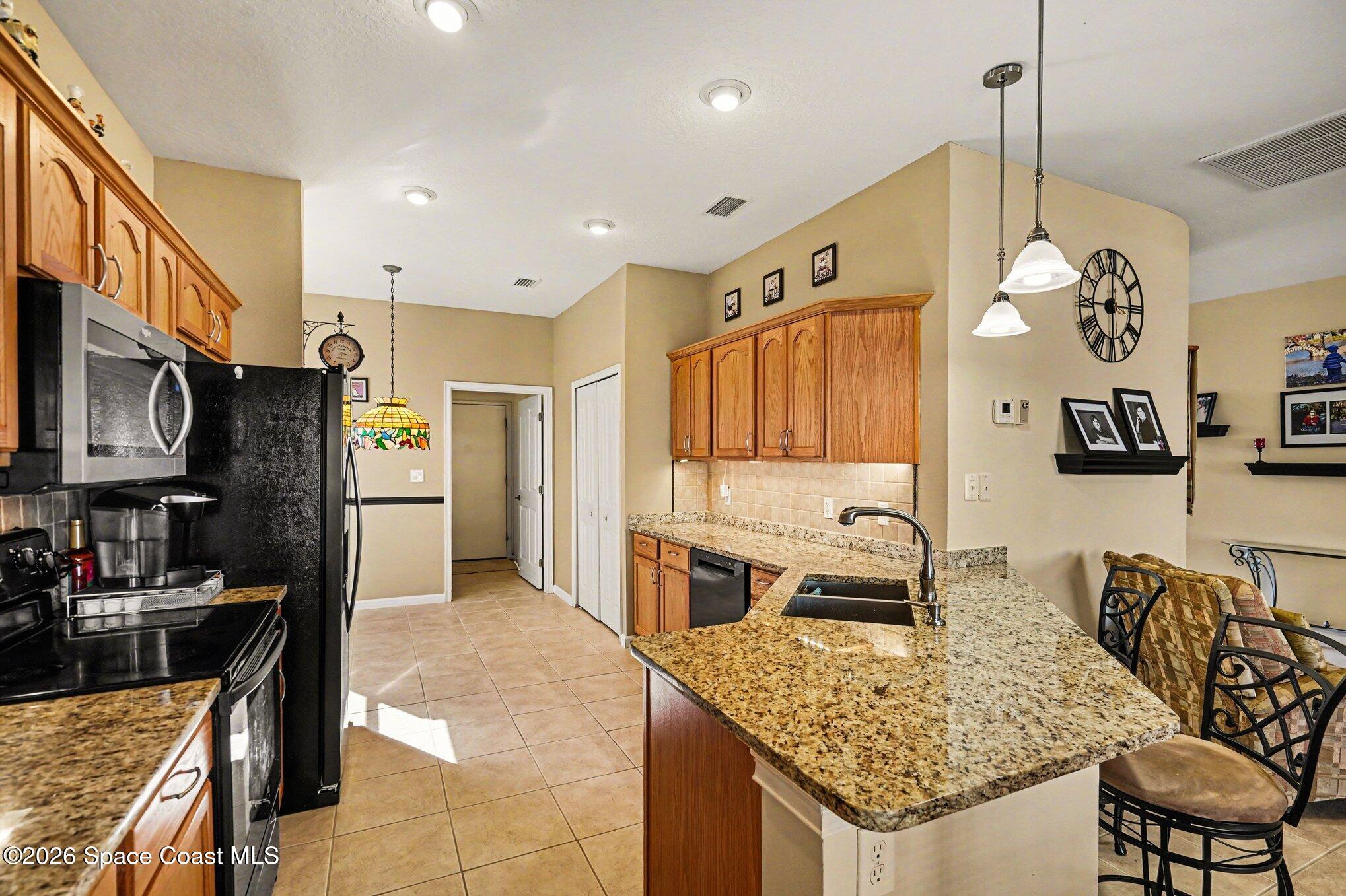 6973 Premonition Drive Melbourne, FL 32940 - Photo 10 of 91 009_file_4068