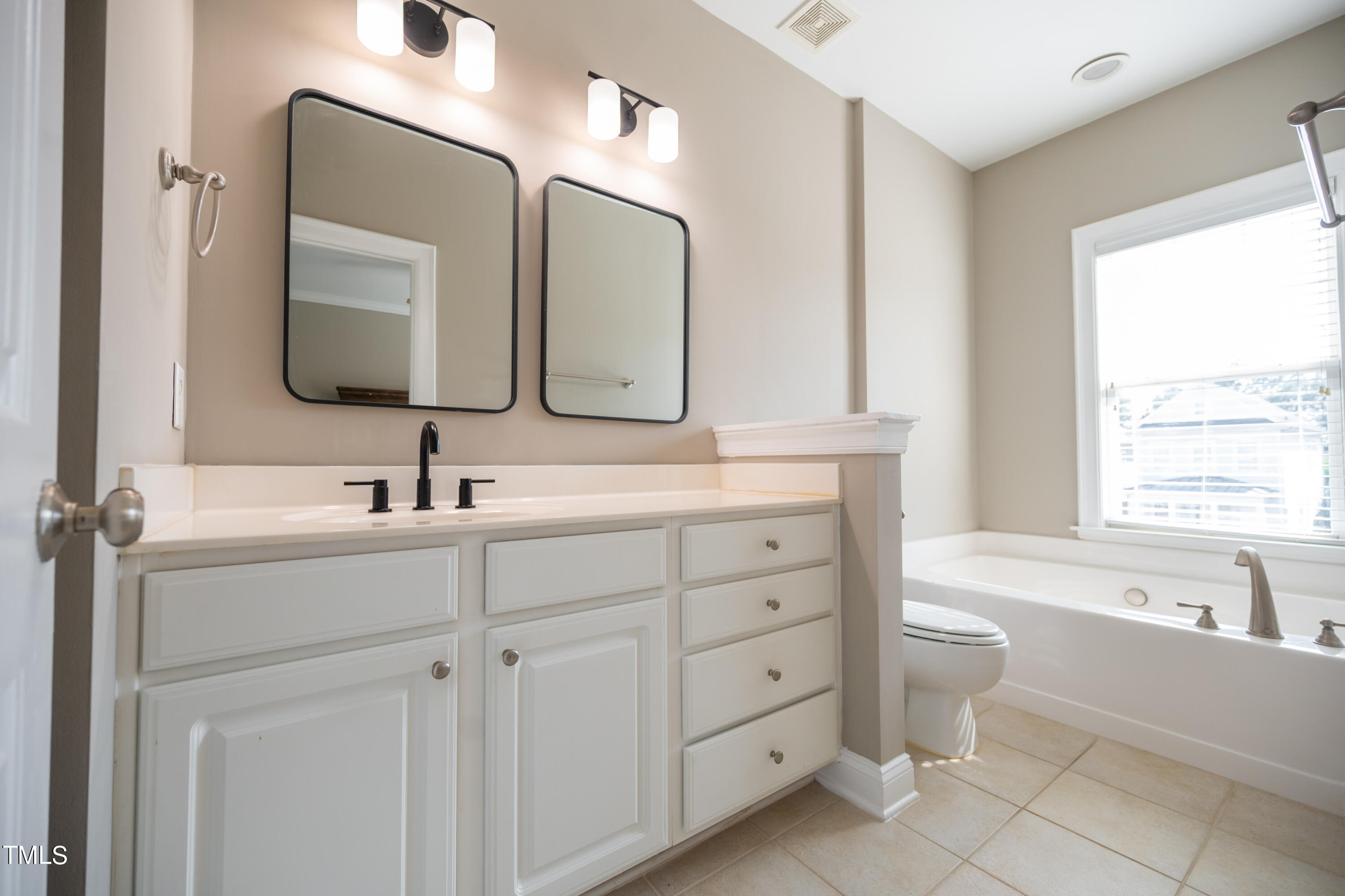 7746 ACC Boulevard Raleigh, NC 27617 - Photo 10 of 19 2nd Floor Primary Bathroom 1
