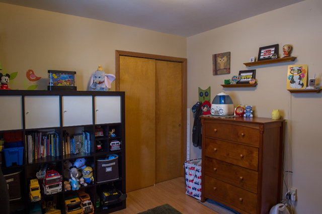 504 East Cleveland Street Spring Valley, IL 61362 - Photo 11 of 18 a bed room with a bed and a book shelf