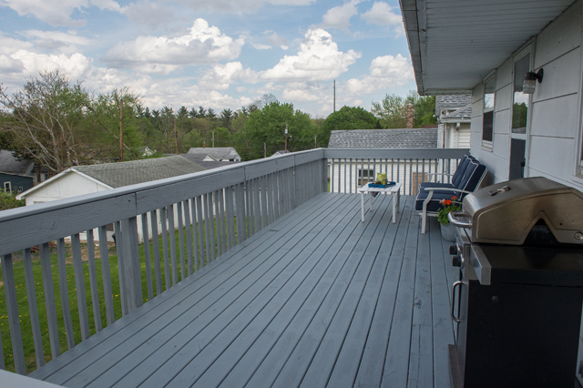 504 East Cleveland Street Spring Valley, IL 61362 - Photo 17 of 18 a balcony with wooden floor table and chairs