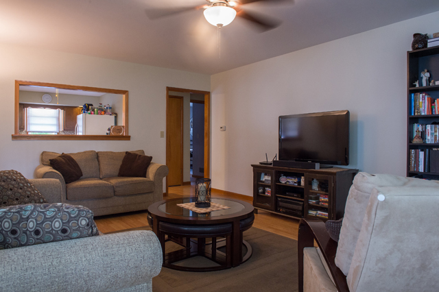 504 East Cleveland Street Spring Valley, IL 61362 - Photo 5 of 18 a living room with furniture and a flat screen tv