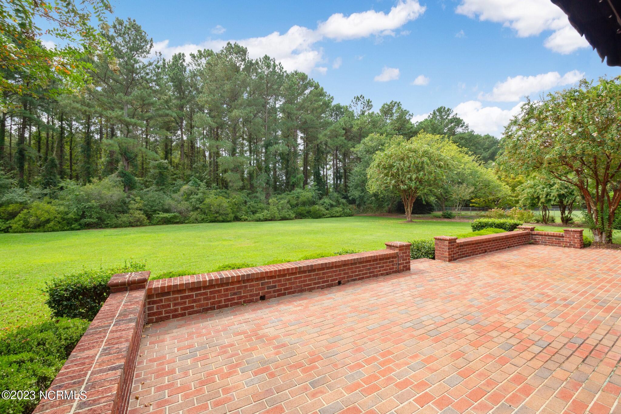 3314 Quail Ridge Road Kinston, NC 28504 - Photo 5 of 29 Large Brick terrace