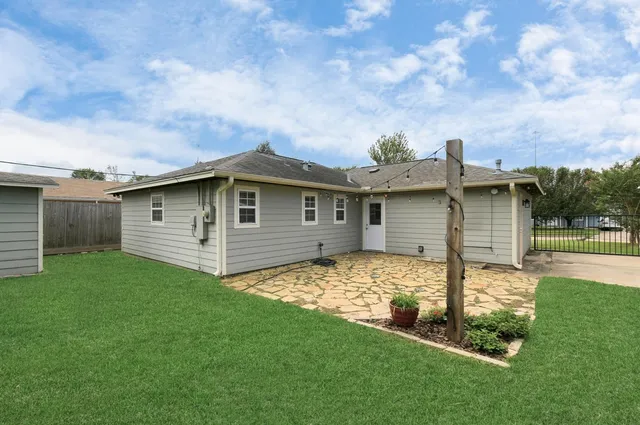 a view of a backyard with a garden