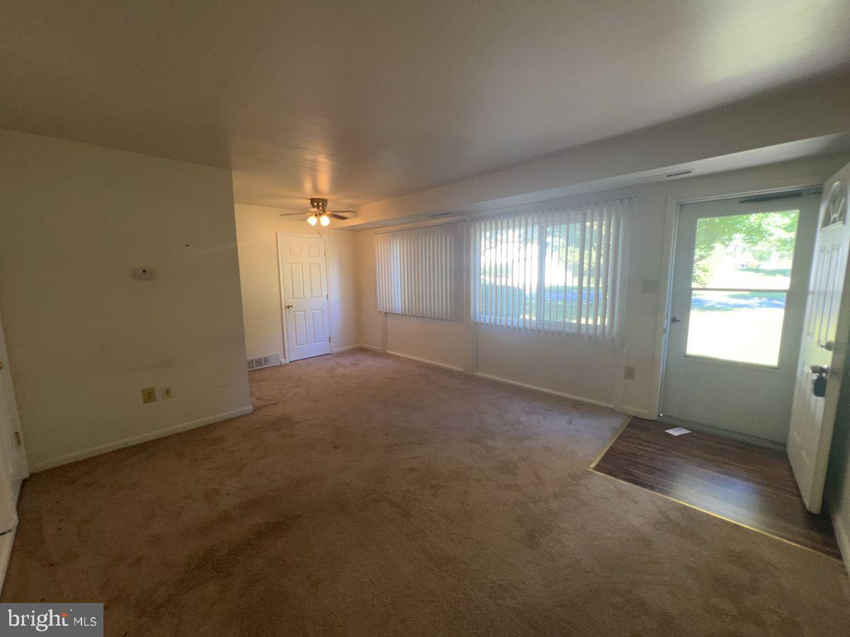 1128 Taney Avenue, Unit 1128 Frederick, MD 21702 - Photo 3 of 7 an empty room with windows