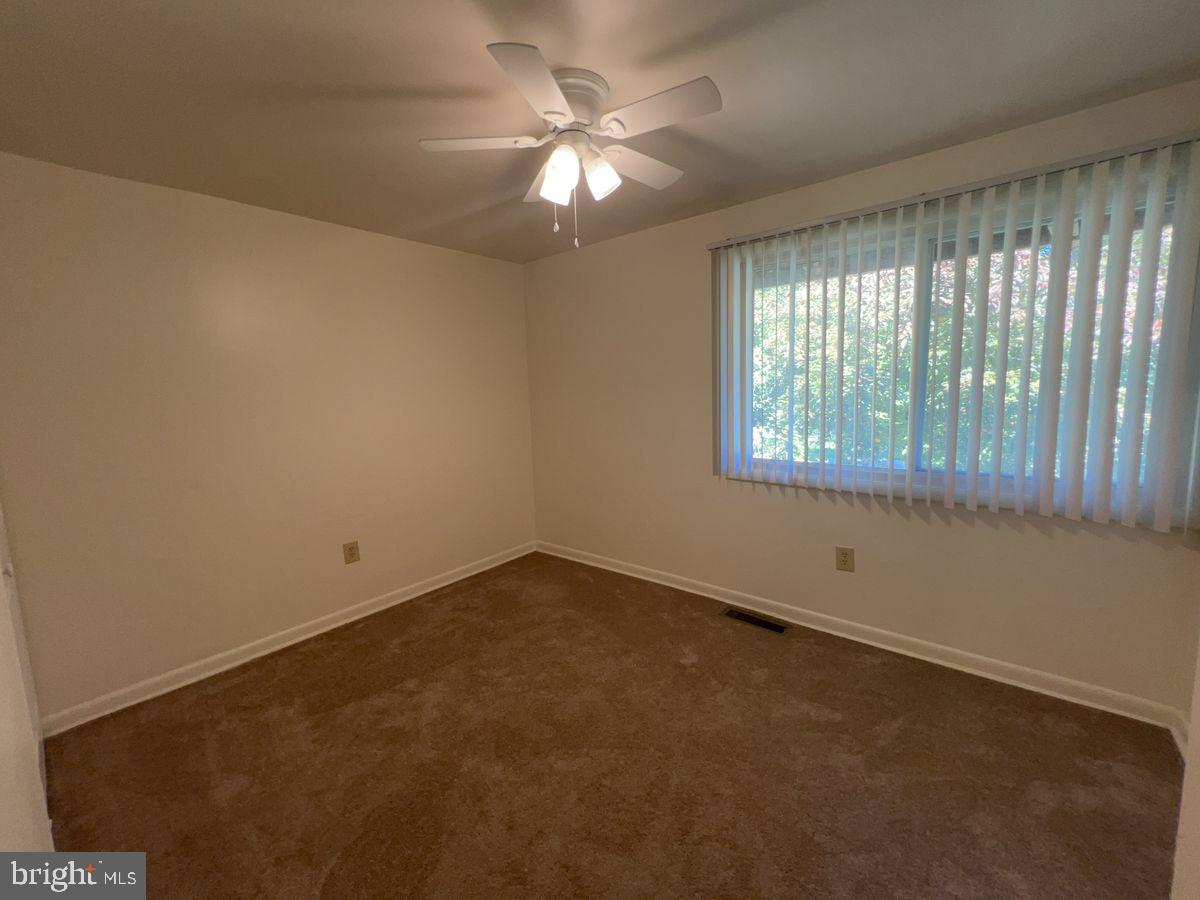 1128 Taney Avenue, Unit 1128 Frederick, MD 21702 - Photo 6 of 7 an empty room with a window
