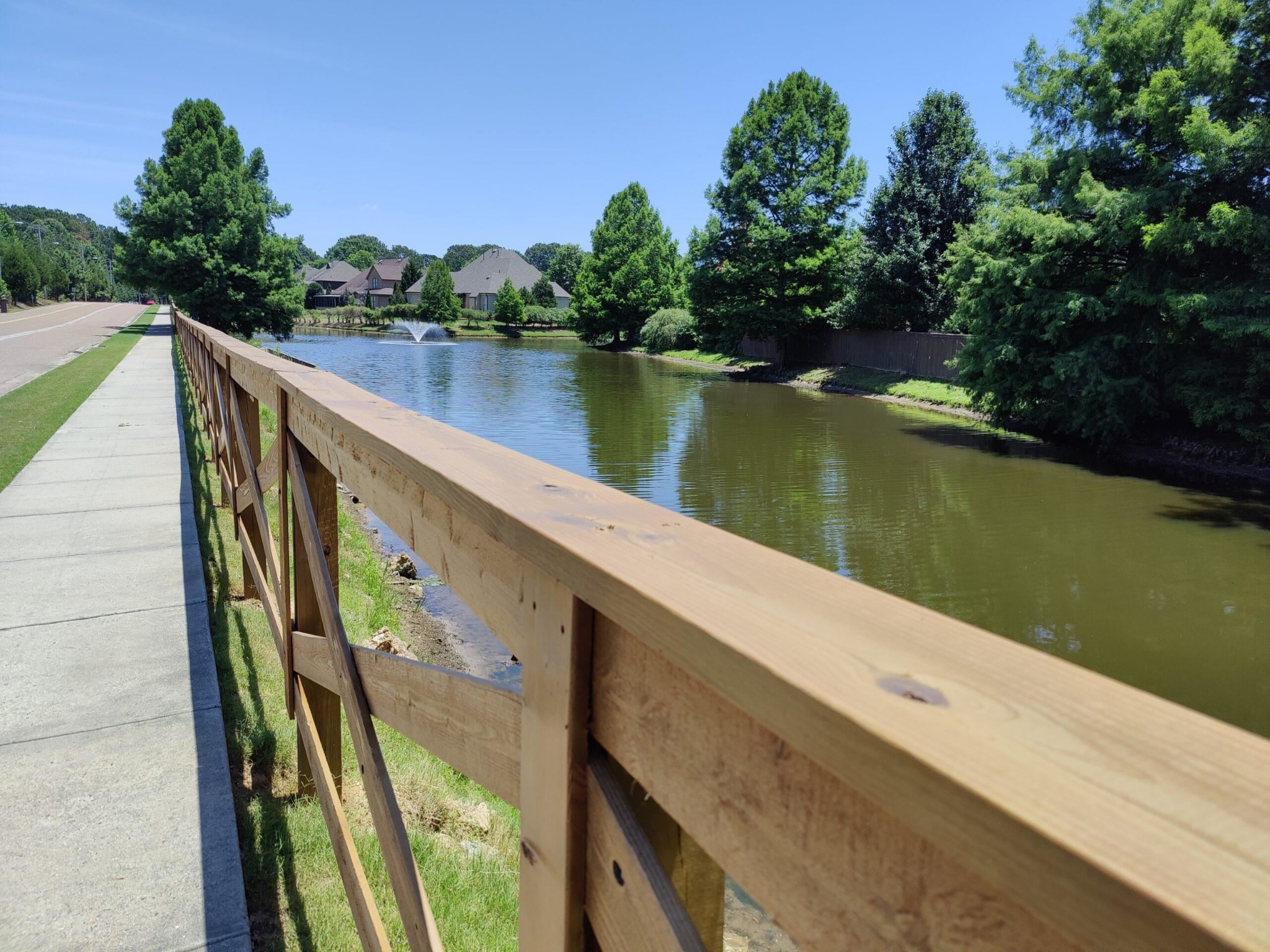4597 Whisper Spring Drive Collierville, TN 38017 - Photo 37 of 39 a view of a lake from a balcony