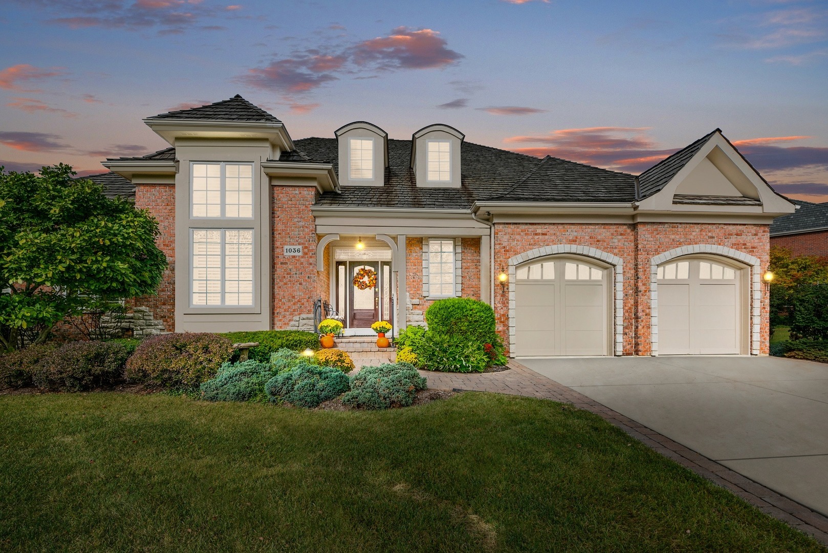 1036 Ridgeview Drive Inverness, IL 60010 - Photo 1 of 35 a front view of a house with garden