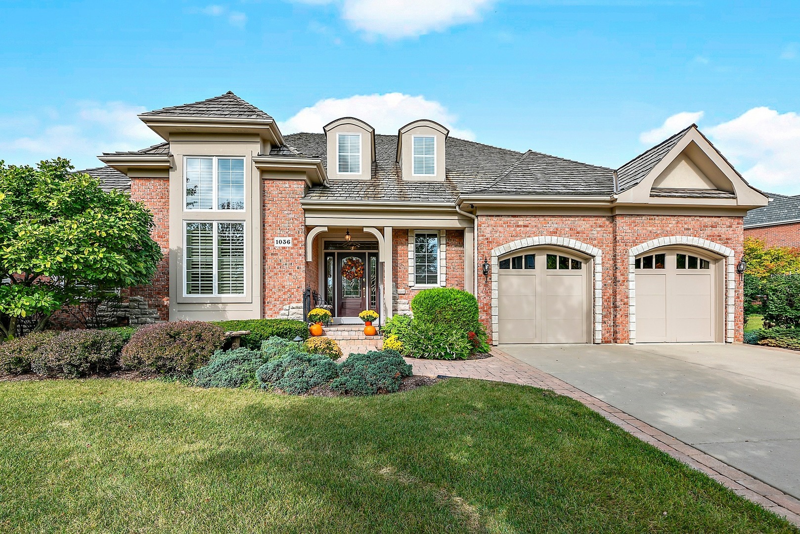 1036 Ridgeview Drive Inverness, IL 60010 - Photo 2 of 35 a front view of a house with garden
