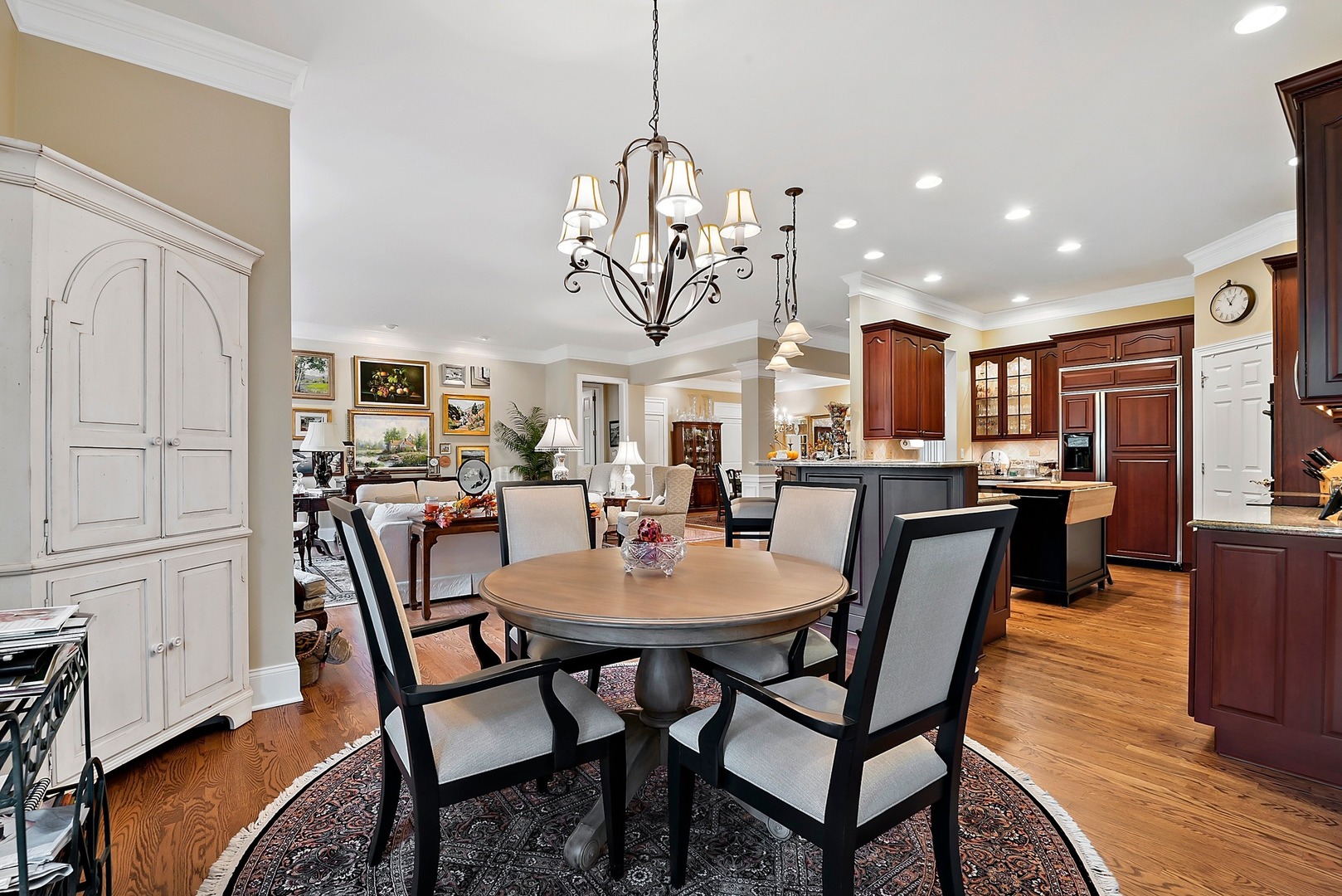 1036 Ridgeview Drive Inverness, IL 60010 - Photo 13 of 35 a view of a dining room with furniture window and wooden floor