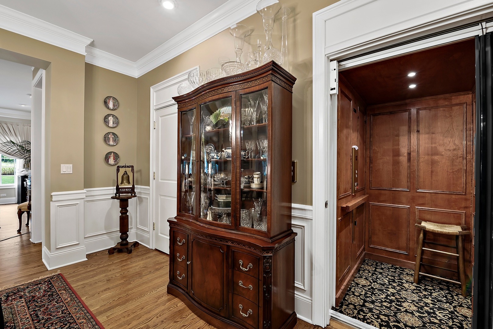 1036 Ridgeview Drive Inverness, IL 60010 - Photo 23 of 35 a room with lots of wooden furniture and a window