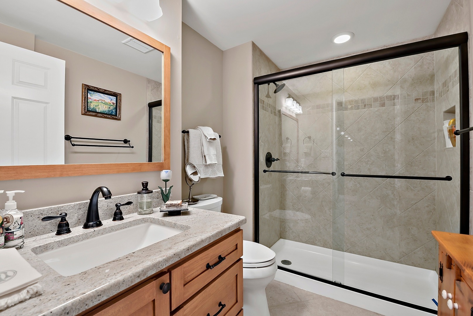 1036 Ridgeview Drive Inverness, IL 60010 - Photo 28 of 35 a bathroom with a granite countertop shower sink vanity and toilet