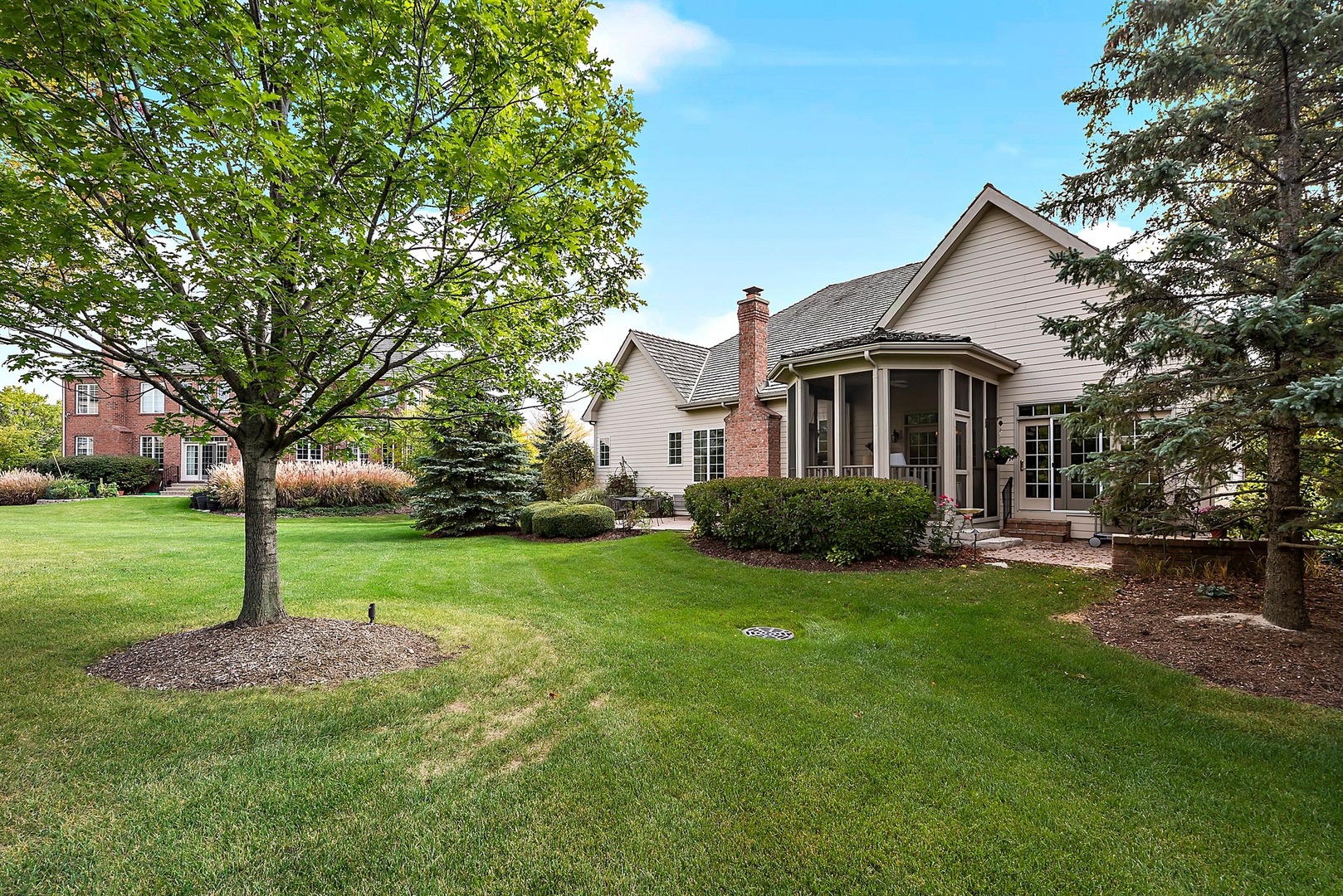 1036 Ridgeview Drive Inverness, IL 60010 - Photo 31 of 35 a front view of house with a garden and trees