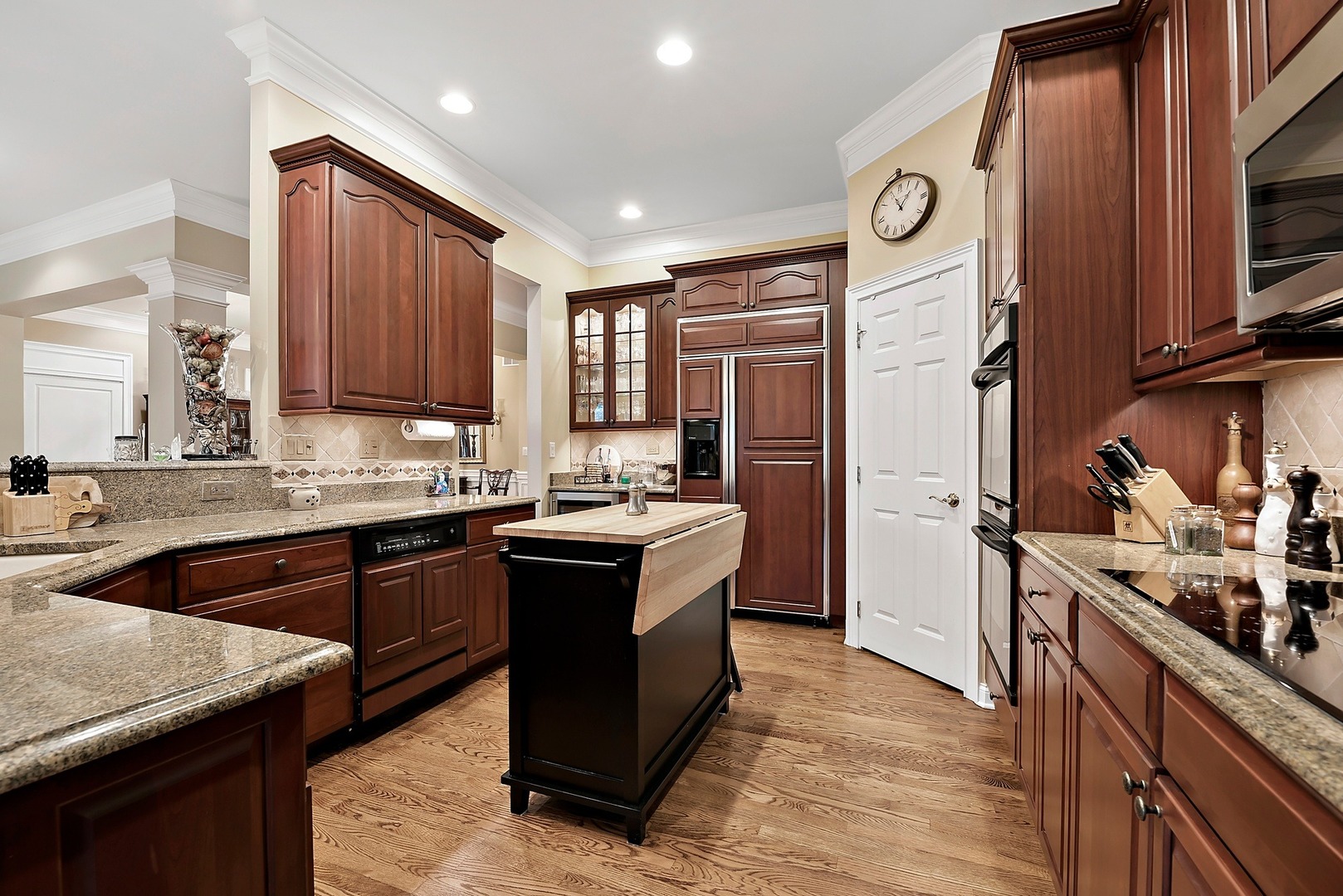 1036 Ridgeview Drive Inverness, IL 60010 - Photo 10 of 35 a kitchen with stainless steel appliances granite countertop a stove refrigerator and a sink