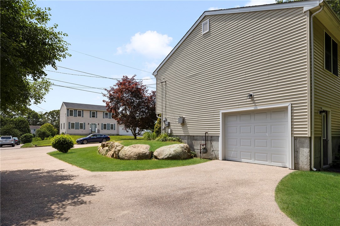 22 Jolly Lane Westerly, RI 02891 - Photo 9 of 26 Under house one car garage