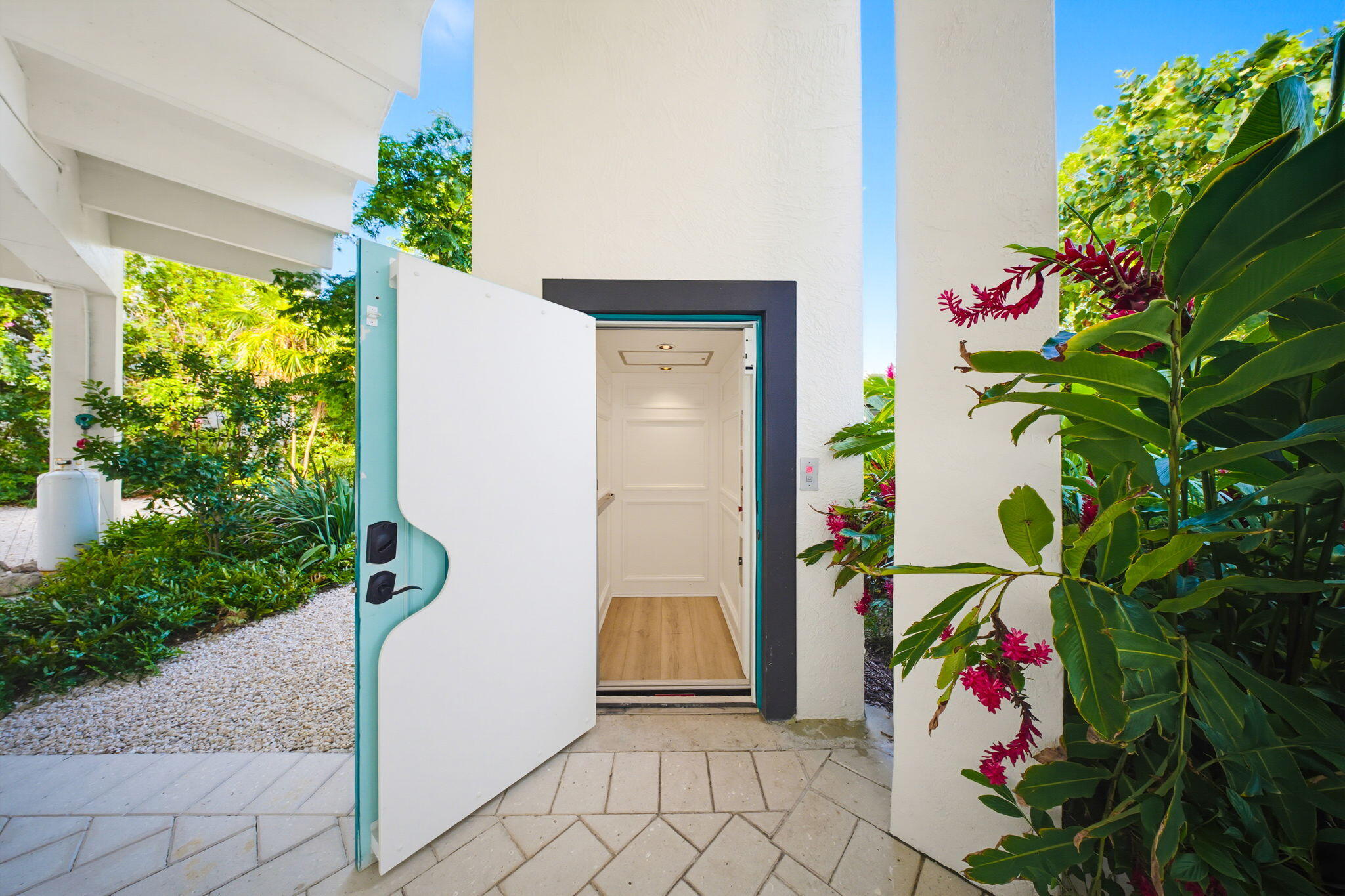 57733 Morton Street Marathon, FL 33050 - Photo 13 of 247 Elevator to Foyer of Main House