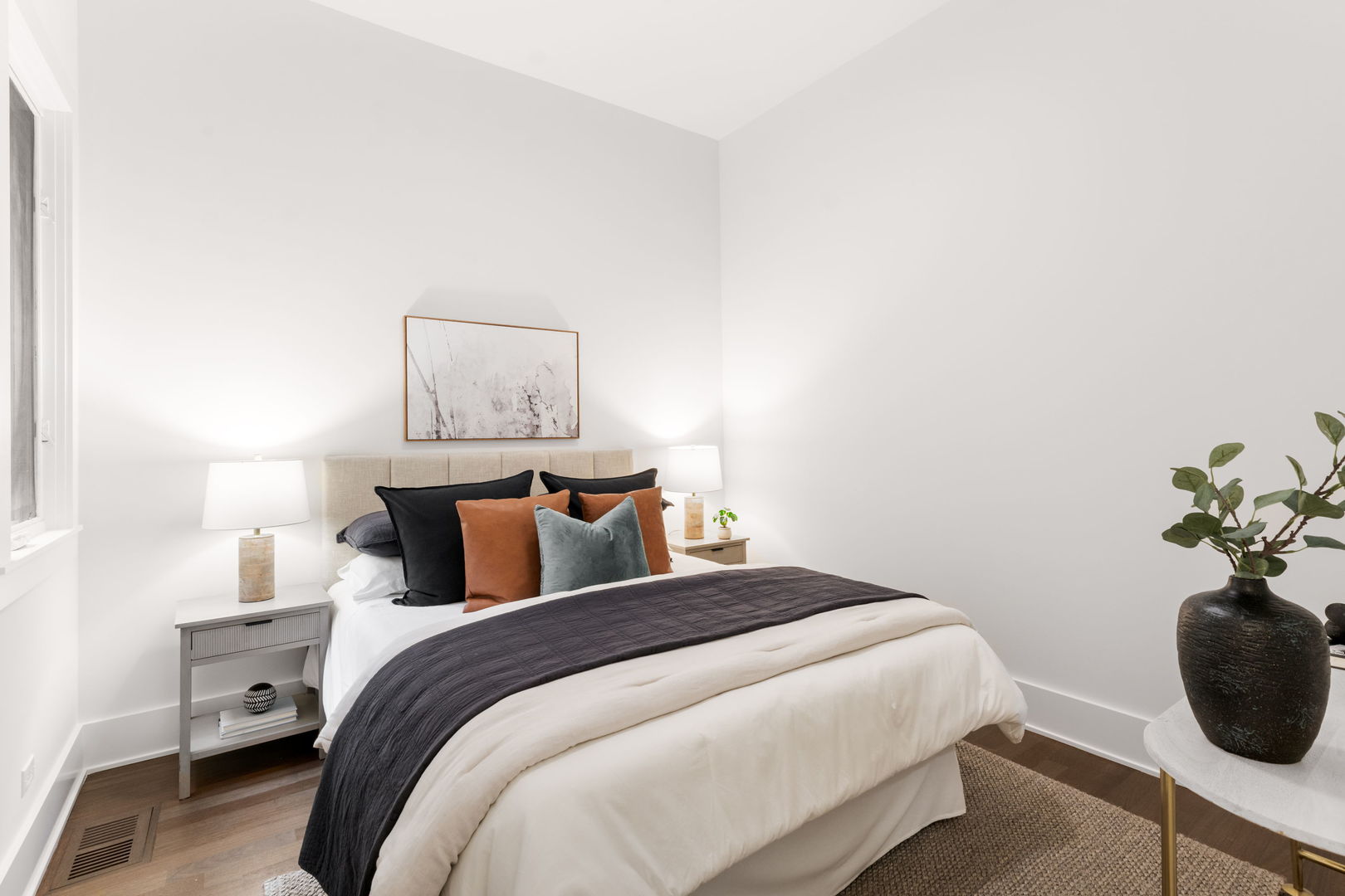 1426 West Irving Park Road, Unit 4 Chicago, IL 60613 - Photo 11 of 19 a bedroom with a bed and a potted plant