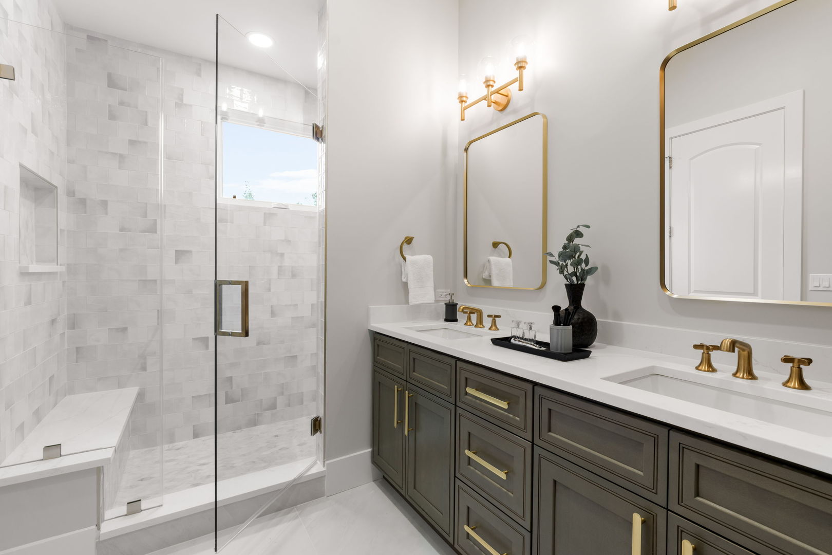 1426 West Irving Park Road, Unit 4 Chicago, IL 60613 - Photo 14 of 19 a bathroom with a shower sink and mirror