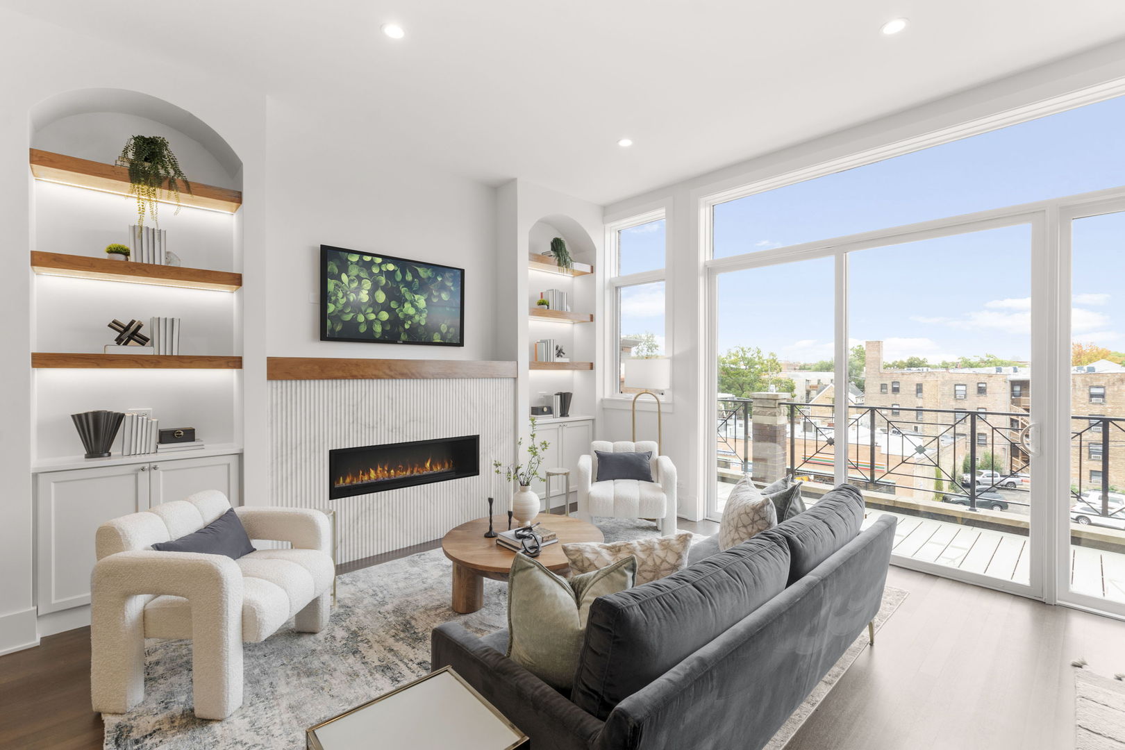 1426 West Irving Park Road, Unit 4 Chicago, IL 60613 - Photo 8 of 19 a living room with furniture fireplace and a large window
