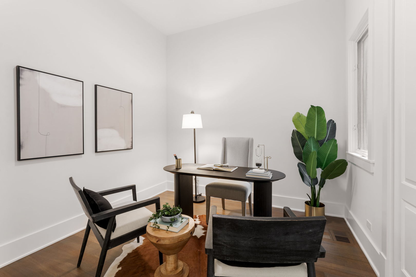 1426 West Irving Park Road, Unit 4 Chicago, IL 60613 - Photo 9 of 19 a living room with furniture a potted plant and a lamp