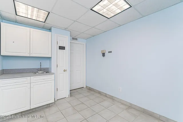 a view of cabinets and window