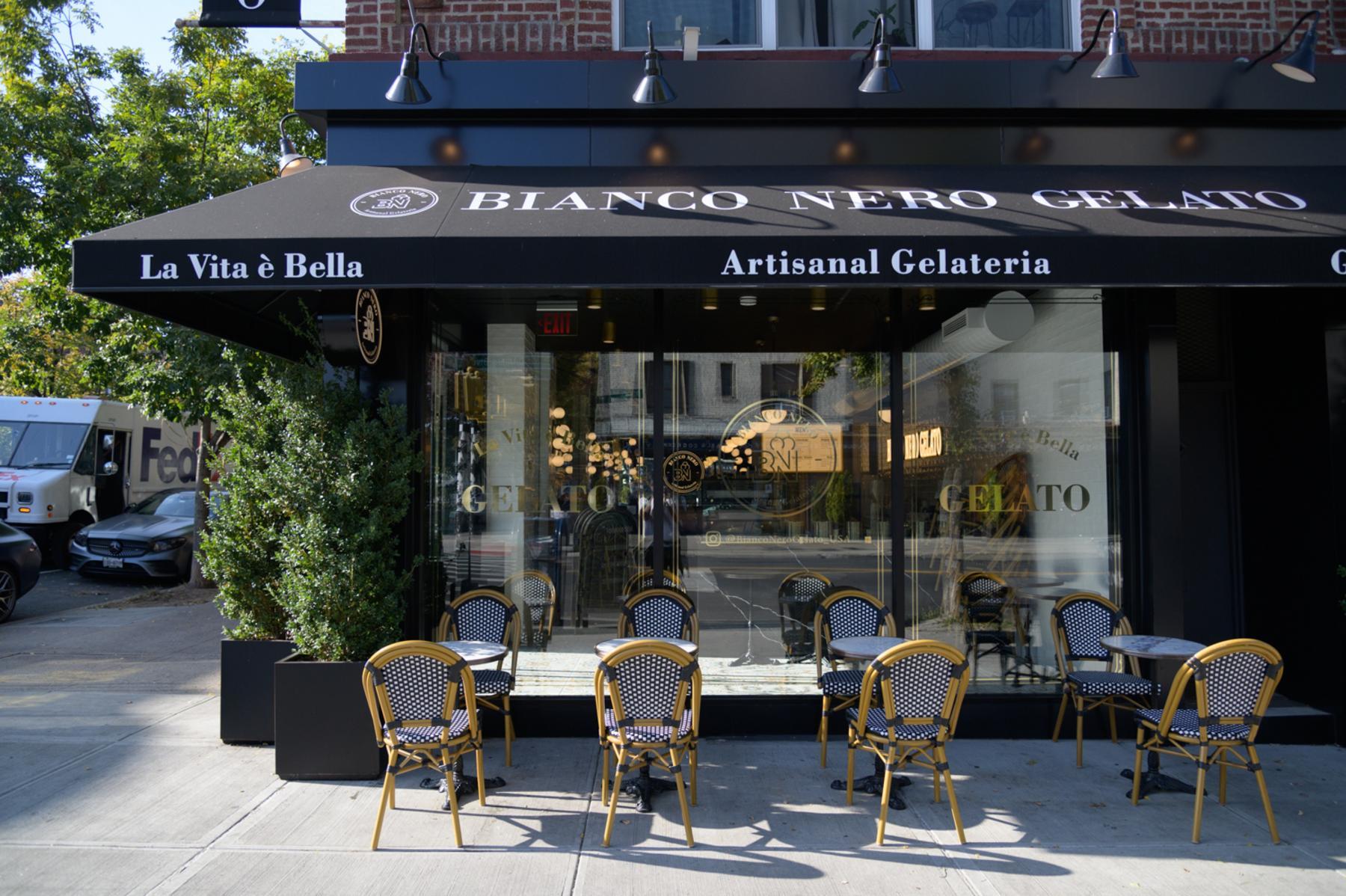 20 Halletts Point, Unit 22405 Queens, NY 11102 - Photo 43 of 47 a view of a cafe with outdoor seating