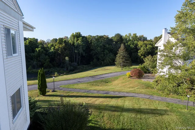 a view of swimming pool from a balcony