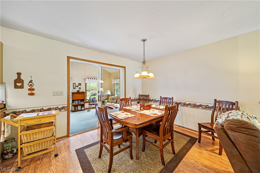 431 Ansel Road Geneva, OH 44041 - Photo 15 of 35 Dining area featuring light laminate flooring