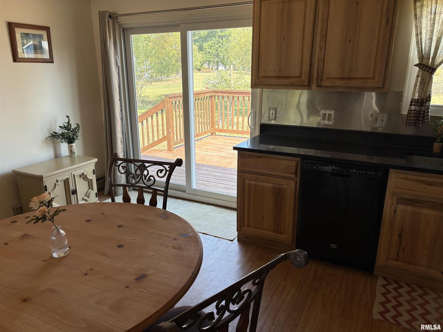 100 North 35th Street Herrin, IL 62948 - Photo 13 of 35 a kitchen with a table chairs and a window
